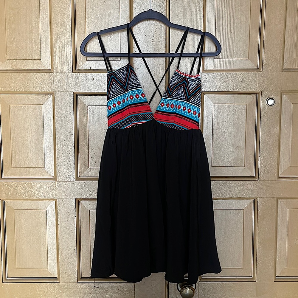 BRAND NEW! Black mini dress! Size small.